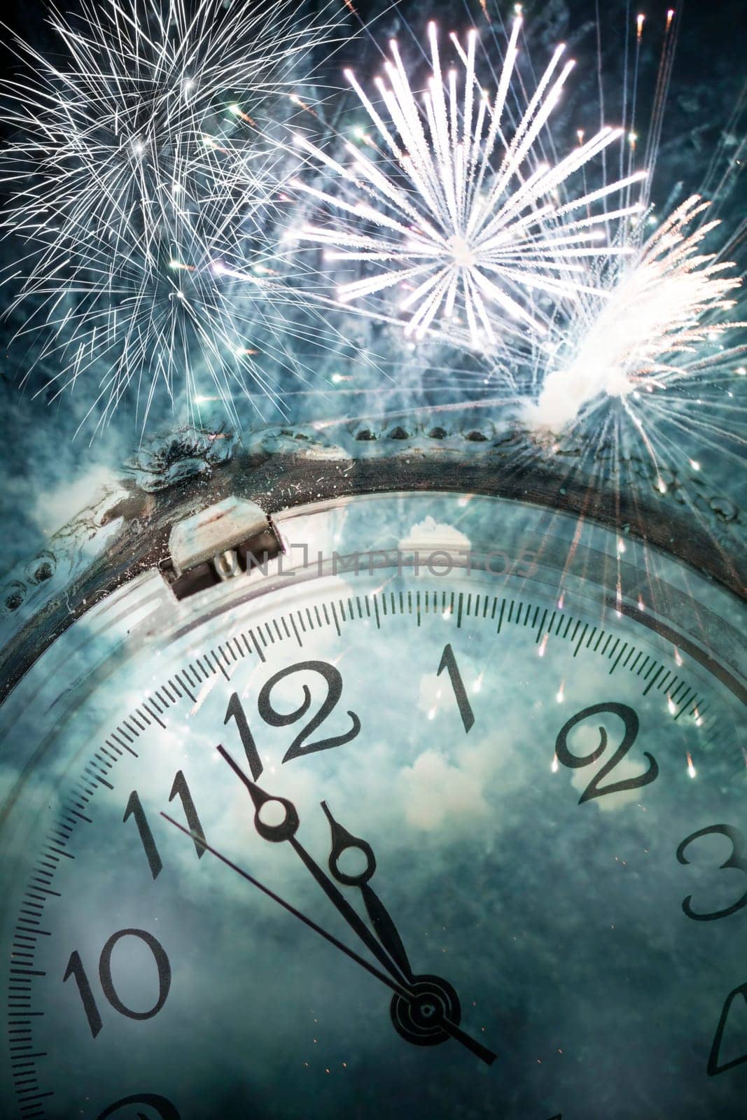 New Year's at midnight - Old clock with stars snowflakes and holiday lights