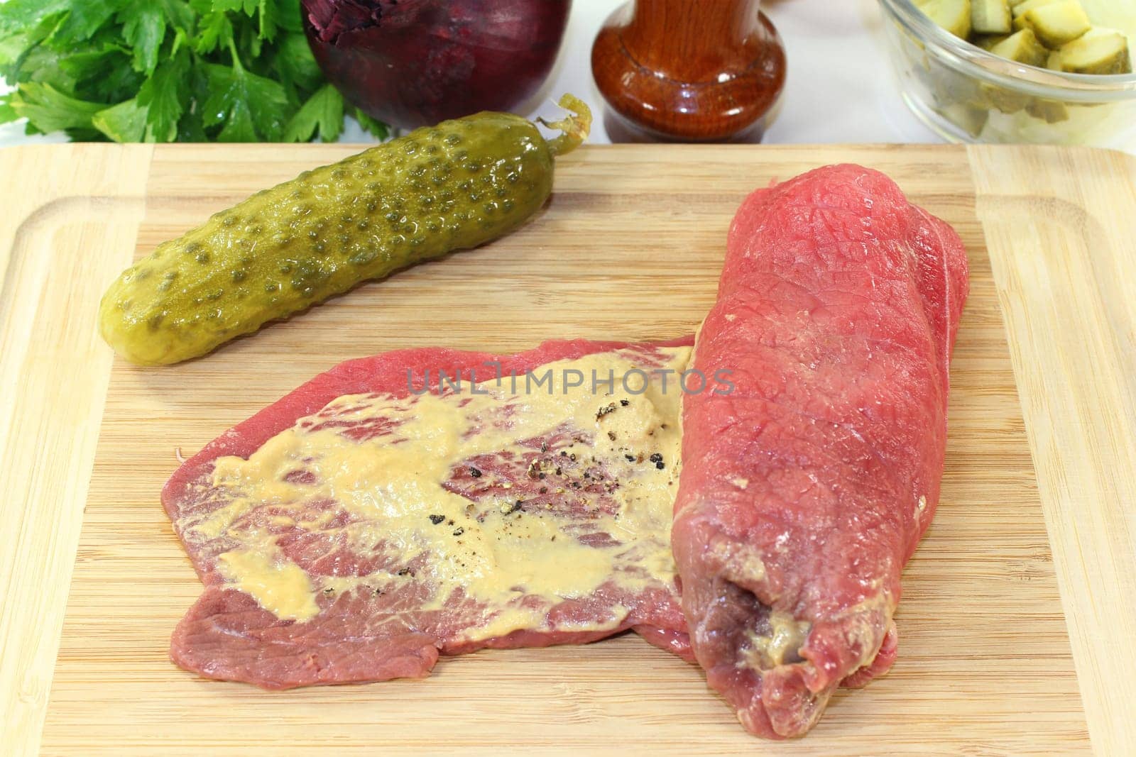 a roulade filled with cucumber,bacon and onions