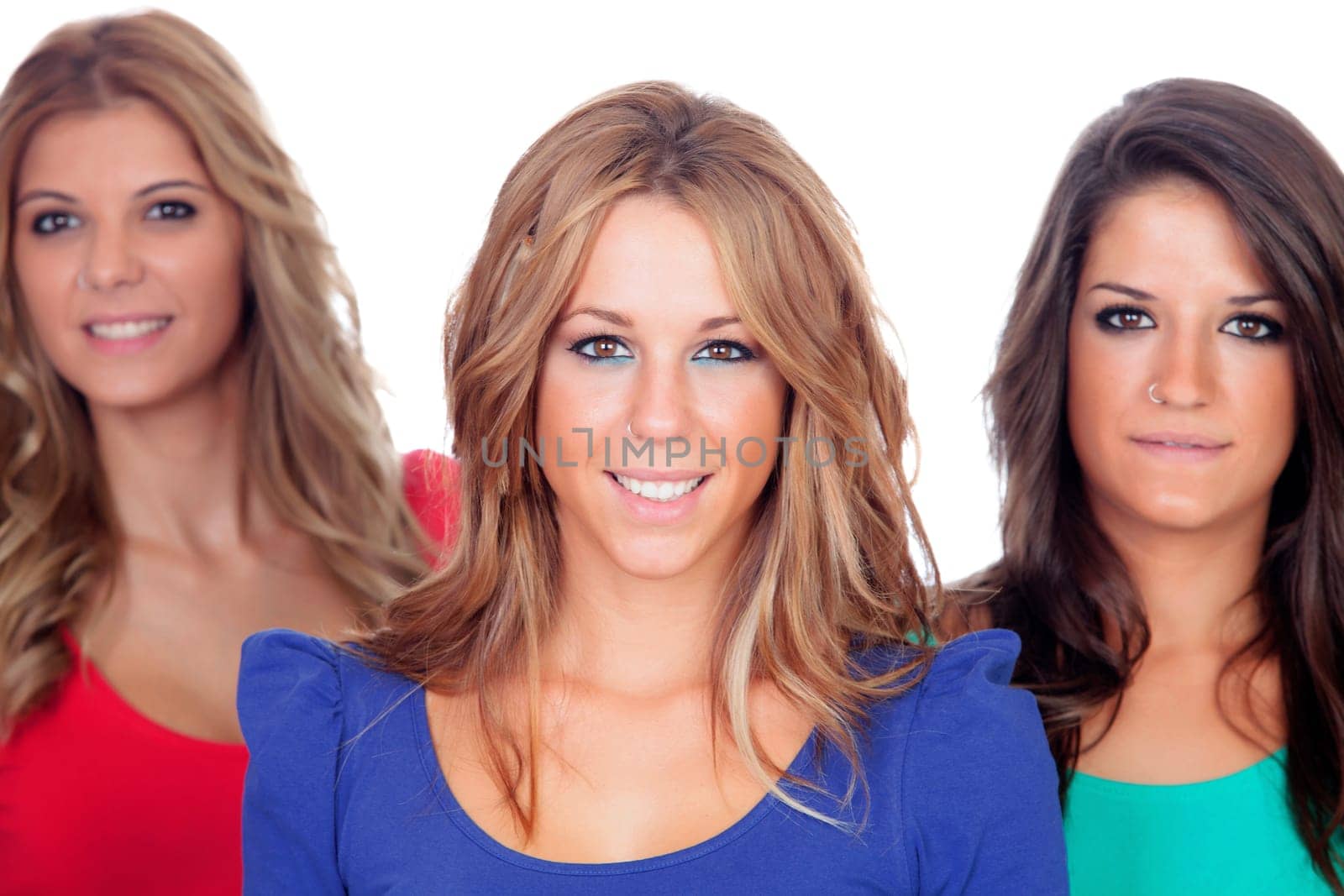 Three good girl friends isolated on a white background
