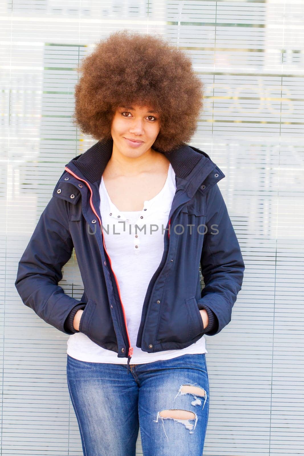 Young modern woman in the city