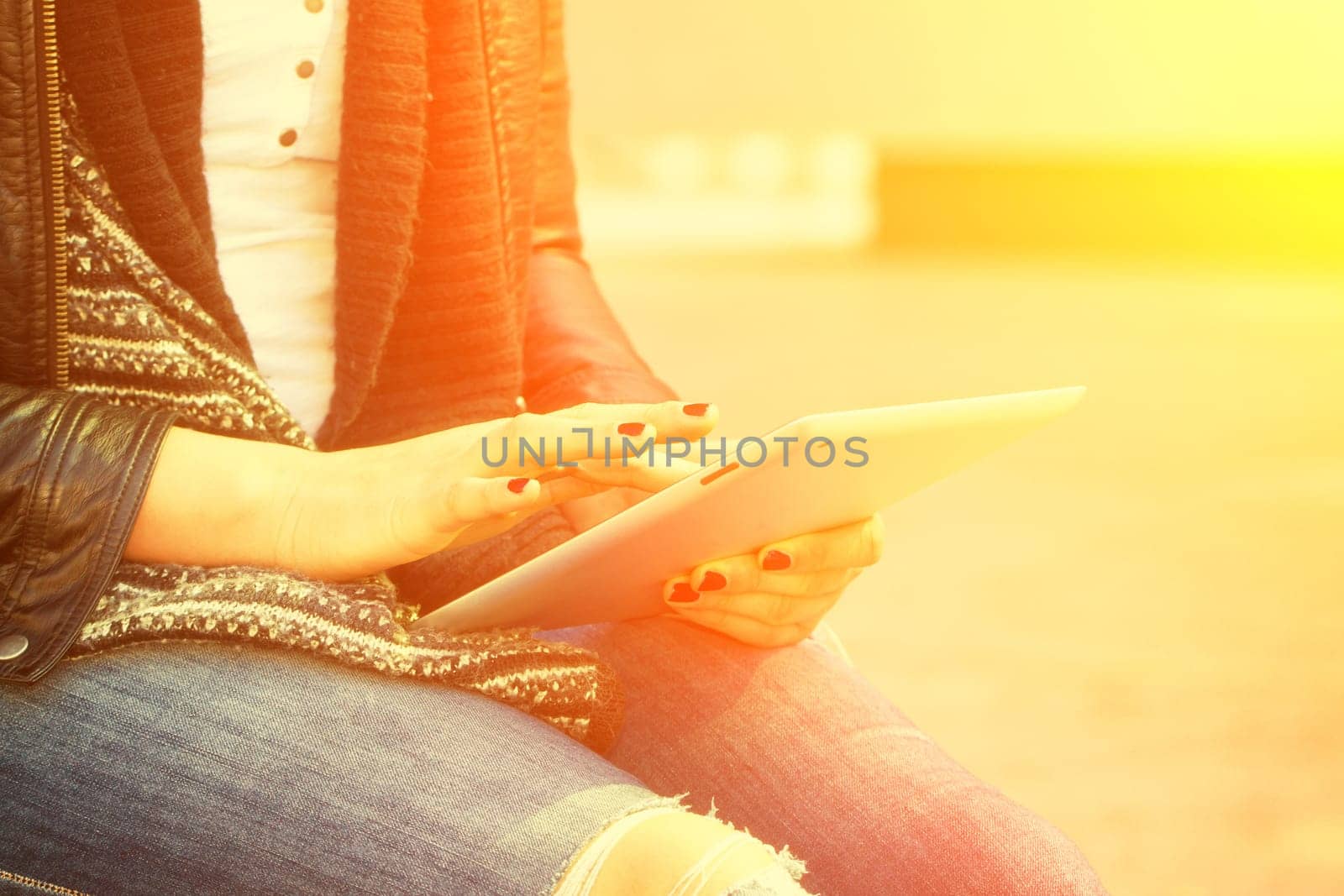 Young modern woman with tablet
