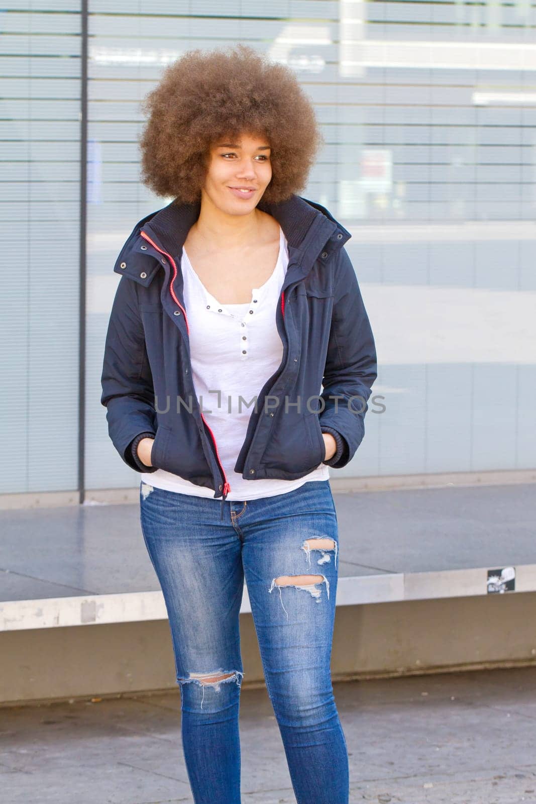 Portrait of a teenager with an afro hairstyle