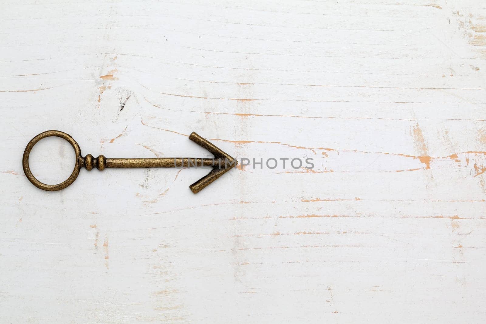 arrow on wood background