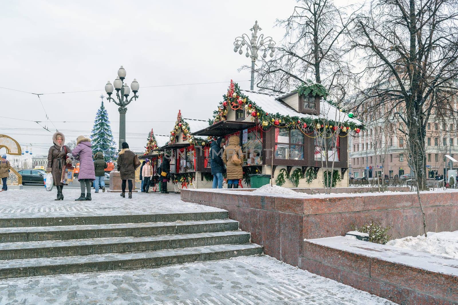 Moscow, Russia - January 05, 2016: Elegant houses with Christmas decorations on a snowy winter's Pushkin Square
