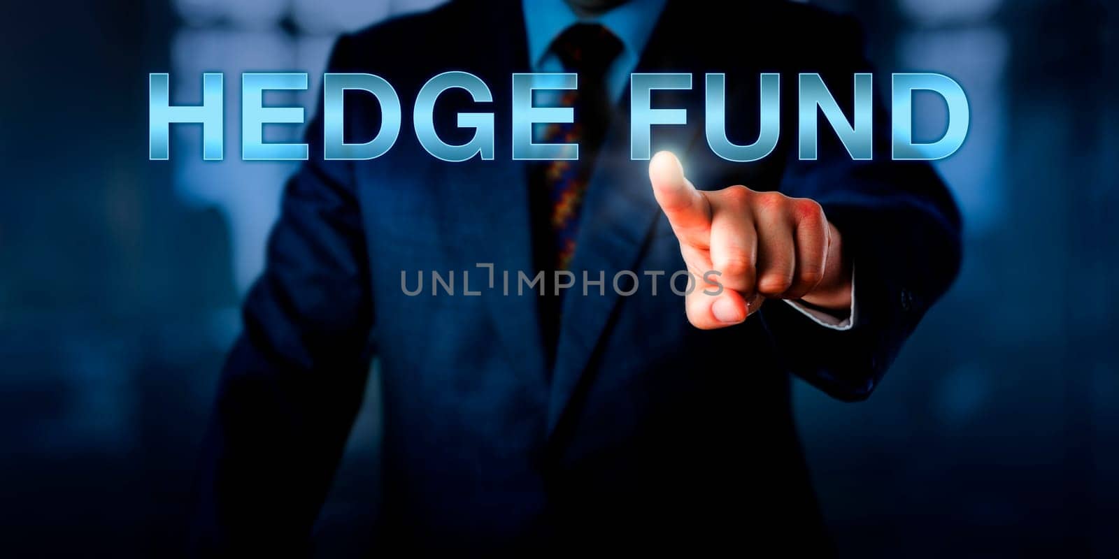 Portfolio manager is pointing at HEDGE FUND on an interactive touch screen. Financial metaphor and business concept for an investment vehicle for liquid assets administered by a management firm.