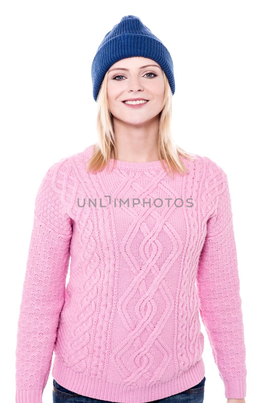 Pretty woman with winter wear posing to camera