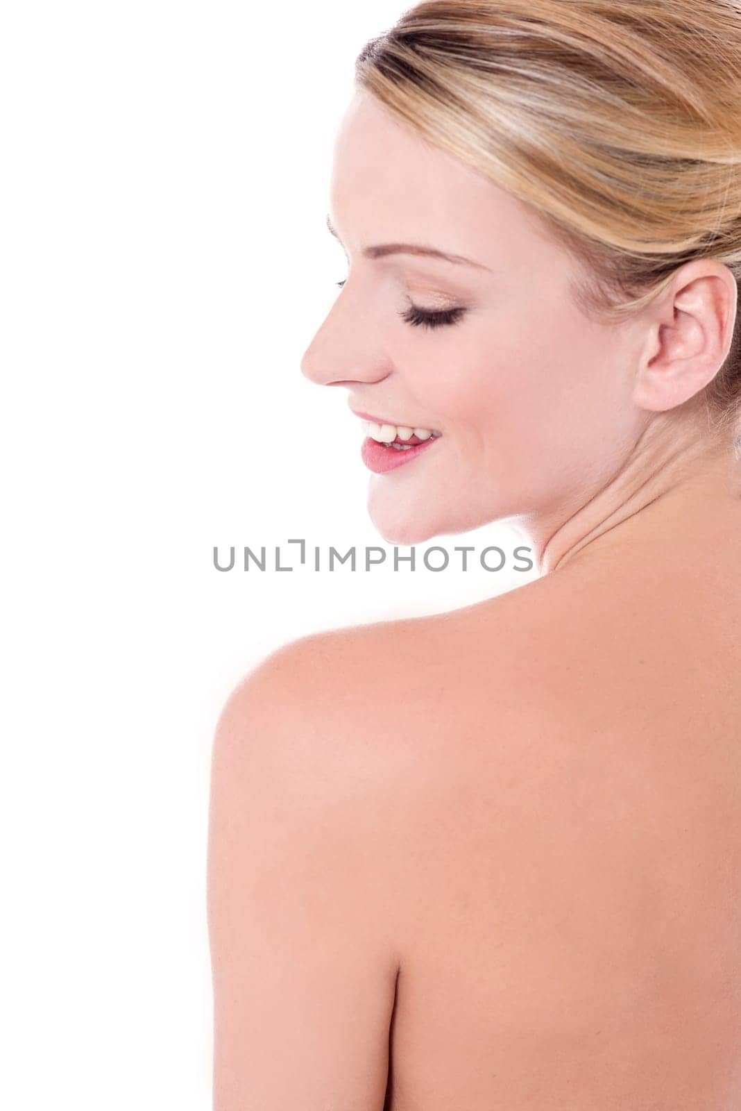 Cropped image of young topless woman over white