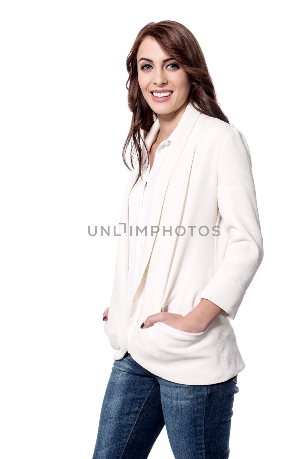 Trendy woman posing with hands in pockets