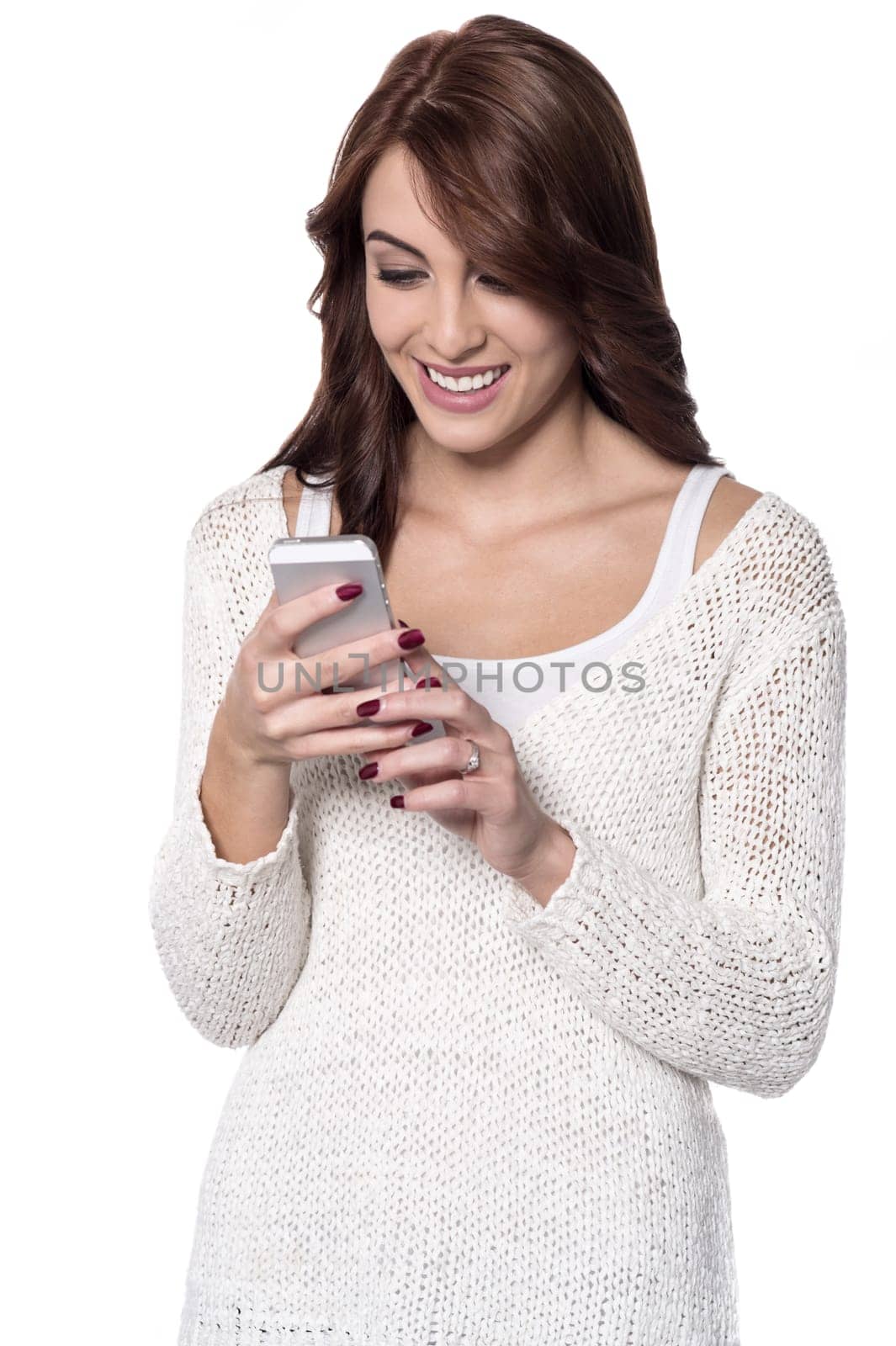 Pretty young girl looking into her smart phone