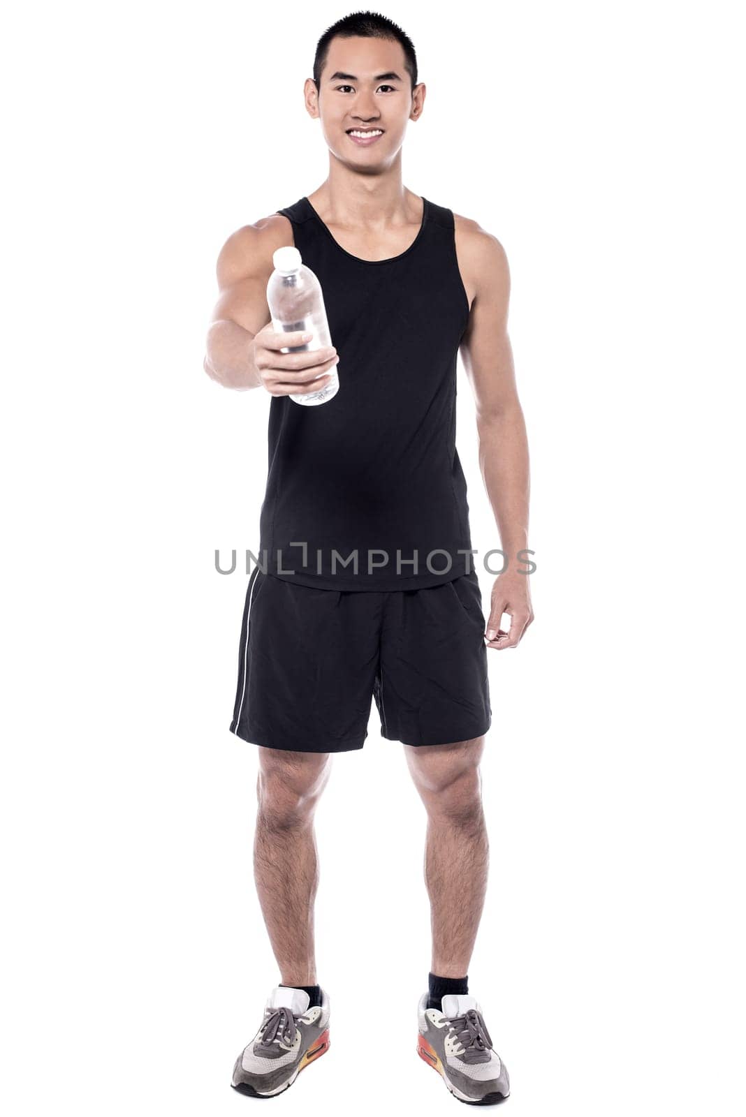 Sports man offering water bottle for refreshment