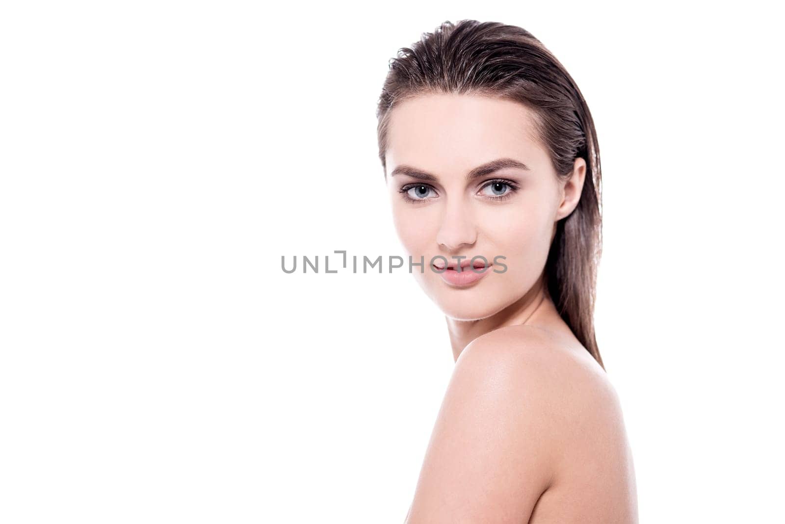 Portrait of beautiful young woman with healthy clean skin
