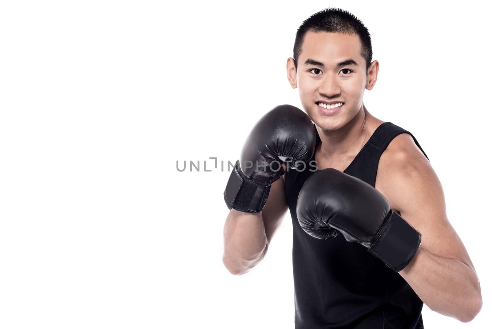 Image of young sportsman who is boxing