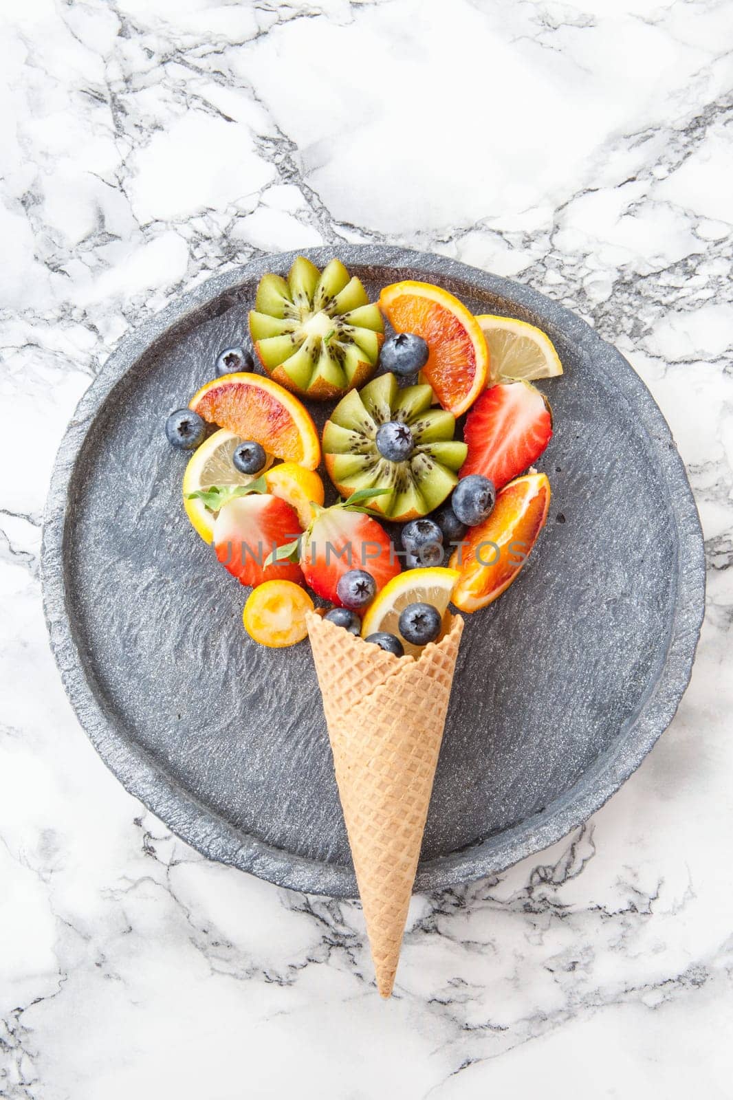 Ice cream with firschen fruchten on stone plate