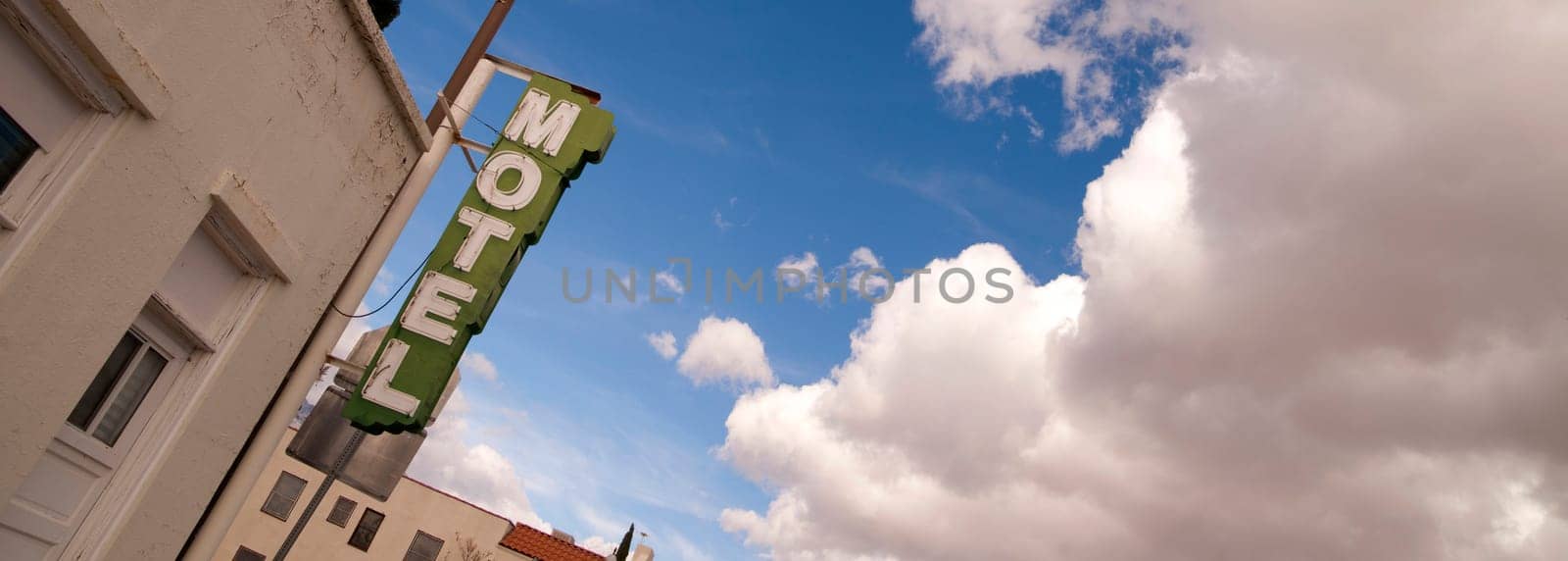 It's a clear blue sky day on main street in this one motel town