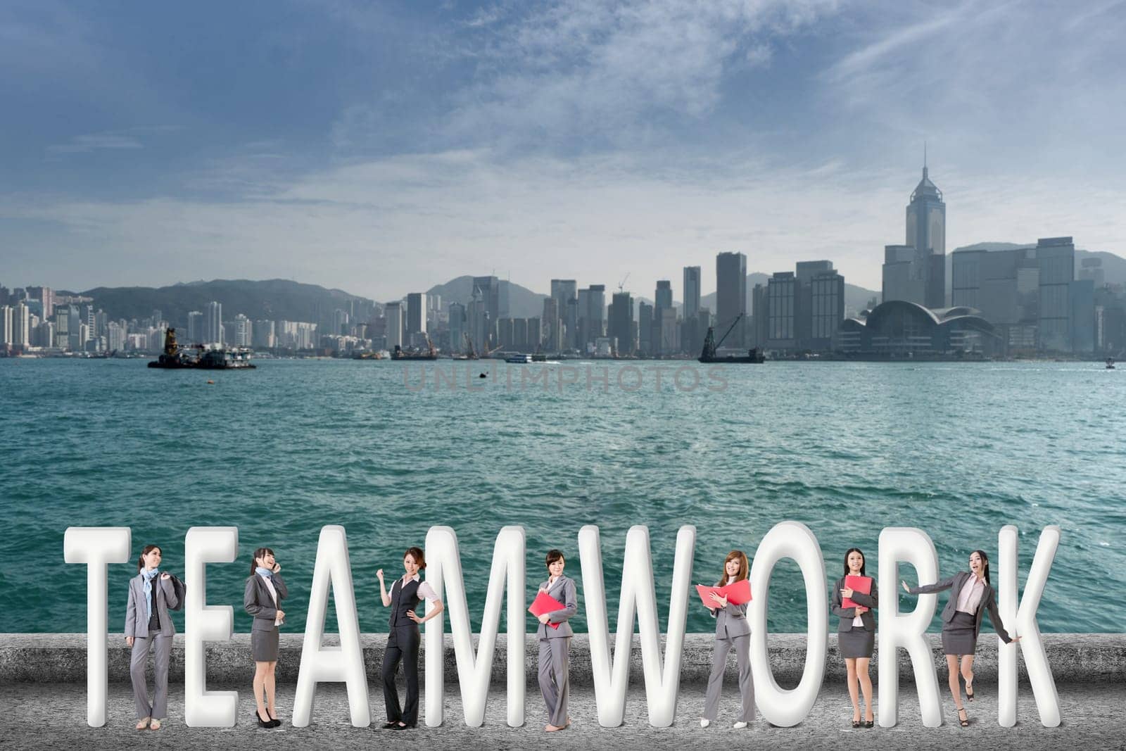 Concept of teamwork with group of business people stand with 3d text.