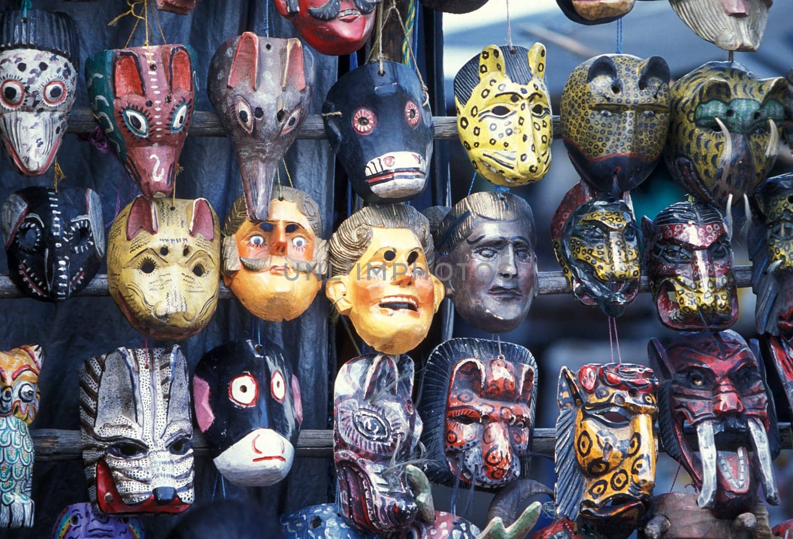 a mask shop at the Market in the Village of Chichi or Chichicastenango in Guatemala in Central America.