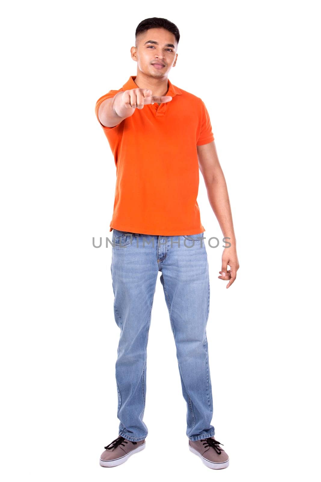 young casual man wearing orange tshirt on white isolated background