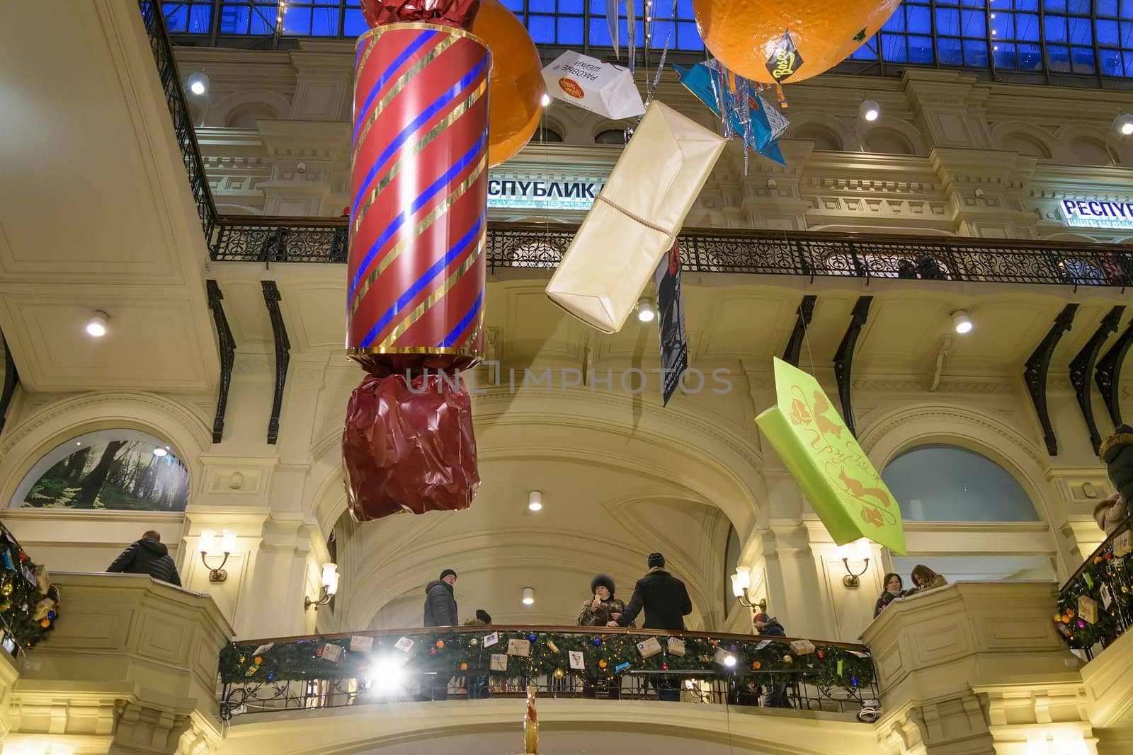 Moscow, Russia - January 05, 2016: Huge decorative artificial candy hanging from the ceiling of a large shopping mall "GUM"""