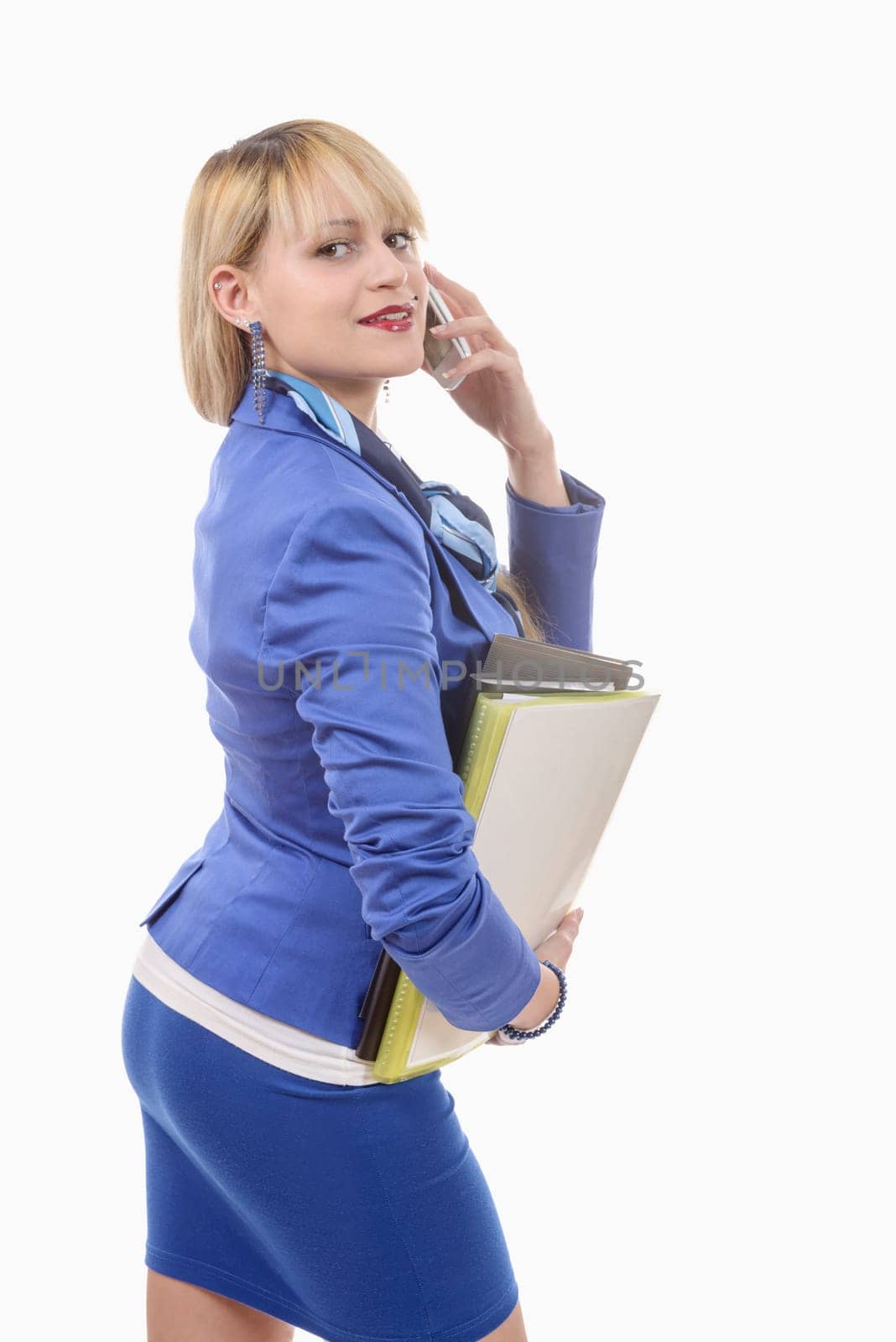 an attractive blond woman in blue business suit, phone