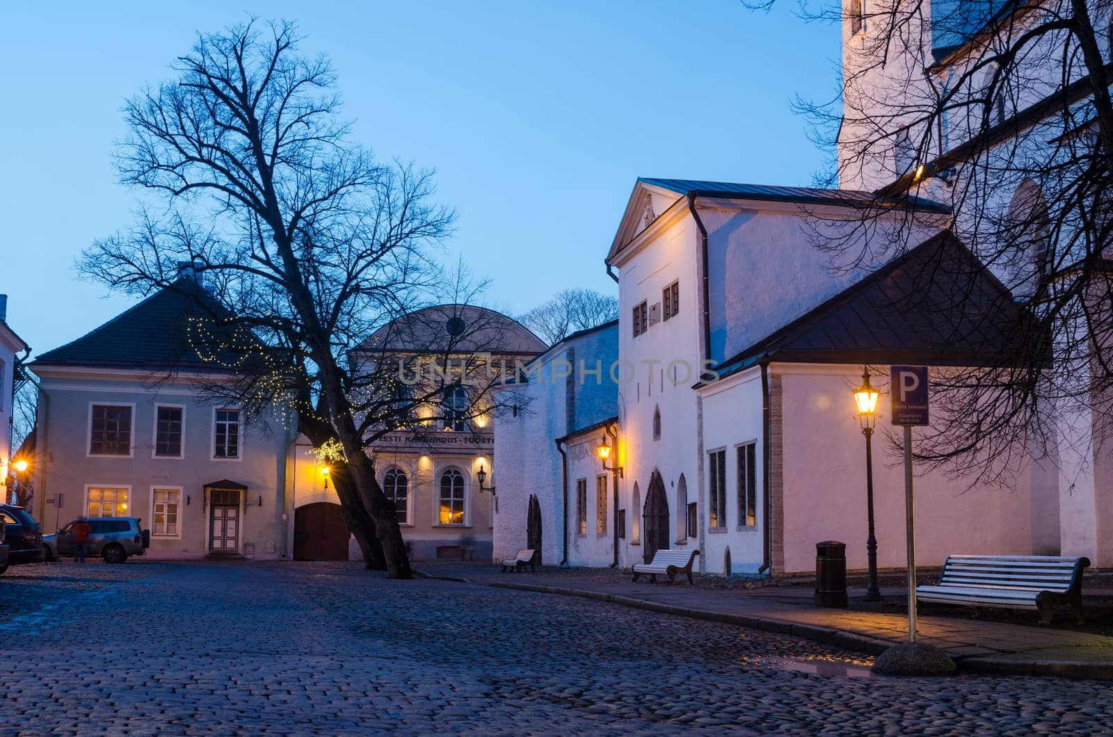 TALLINN, ESTONIA -JANUARY 05: People walk down the street in the Old Town Christmas holidays in Tallinn on January 05, 2014 in Tallinn , Estonia.