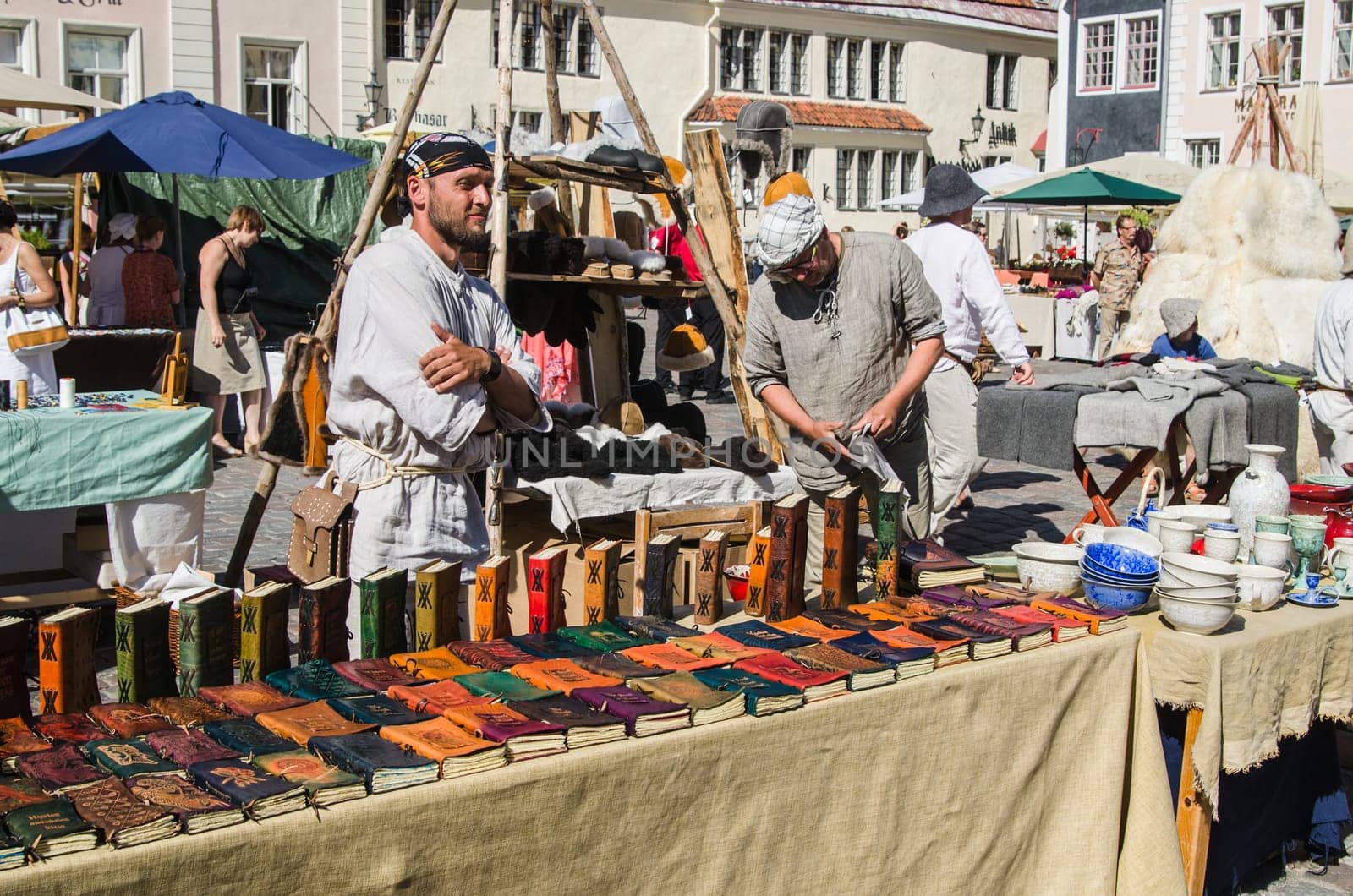 TALLINN, ESTONIA - JULY 7: Master crafts sell their products on the Medieval market In Old City On July 7, 2013 In Tallinn.