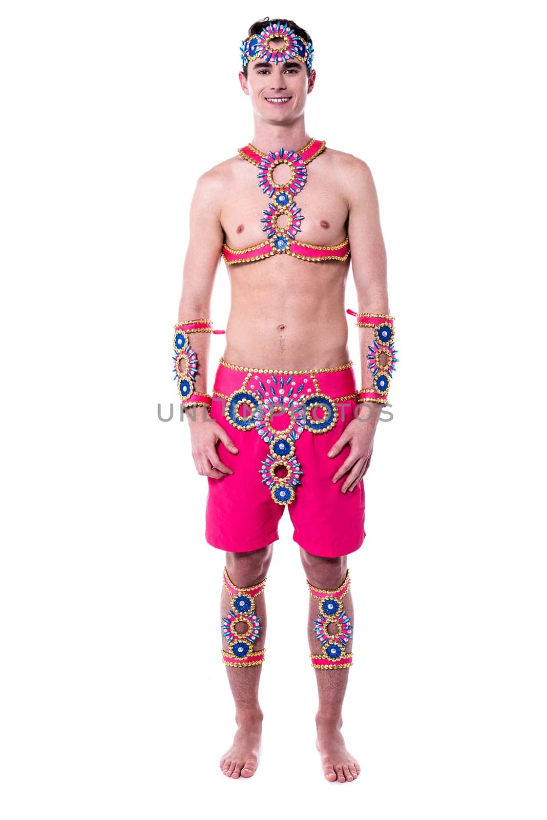 Handsome male samba dancer posing over white