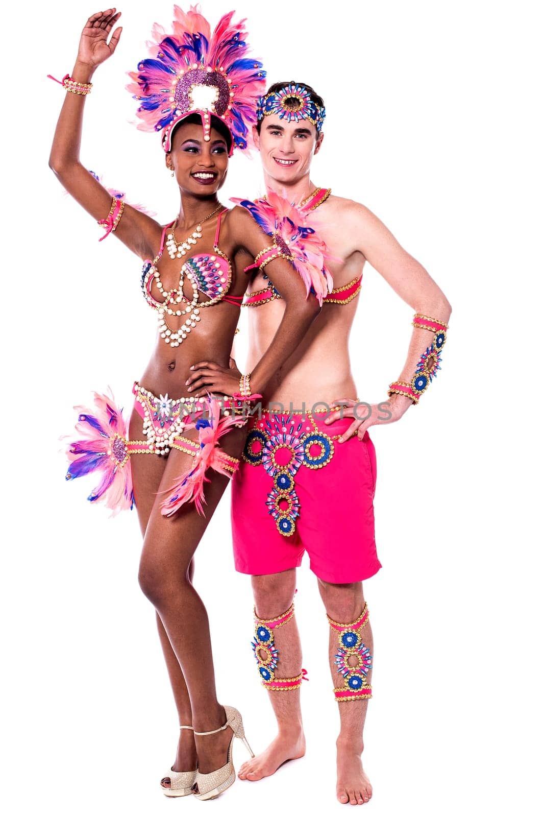 Dancing young couple on a white background