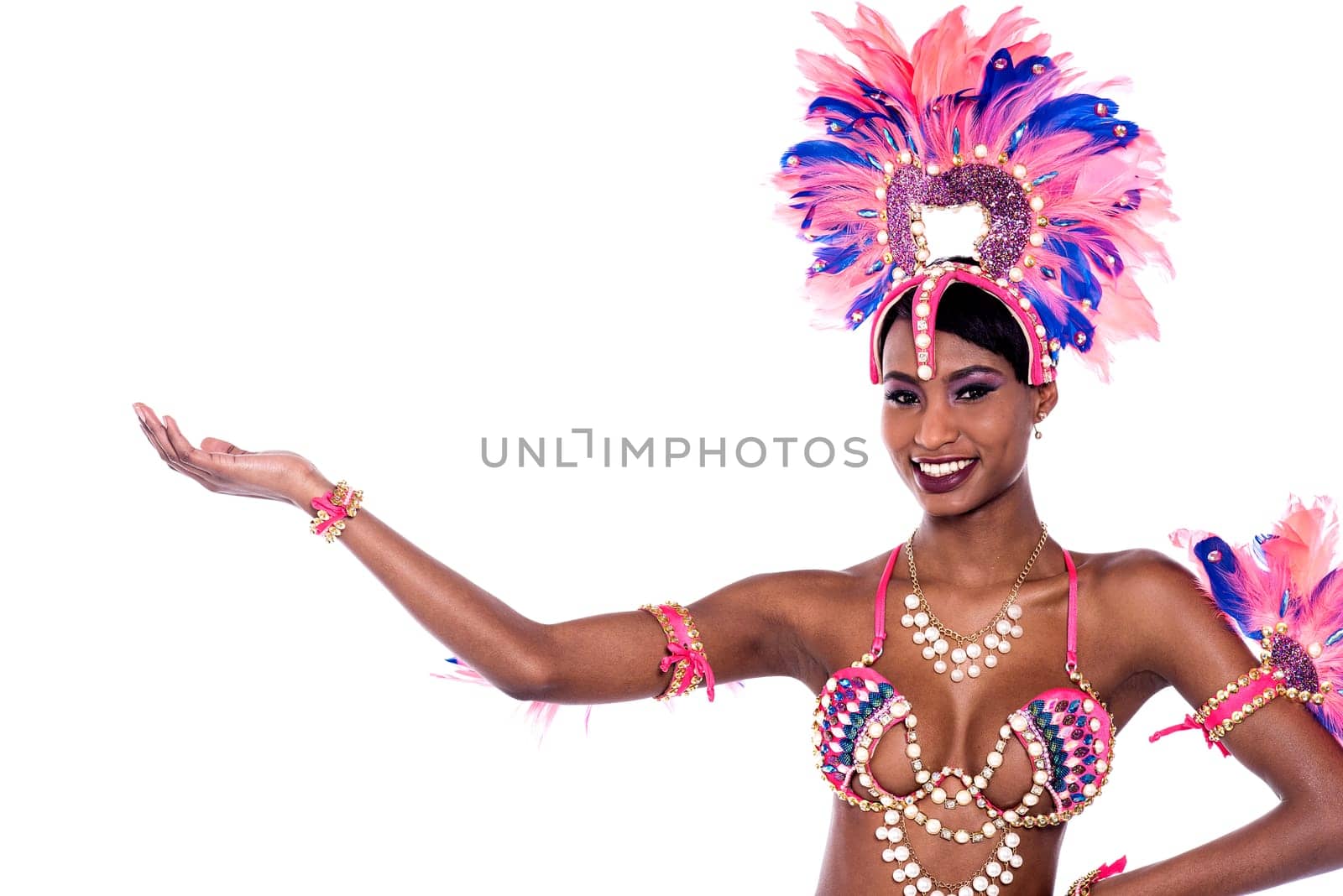 Female samba dancer showing to copy space