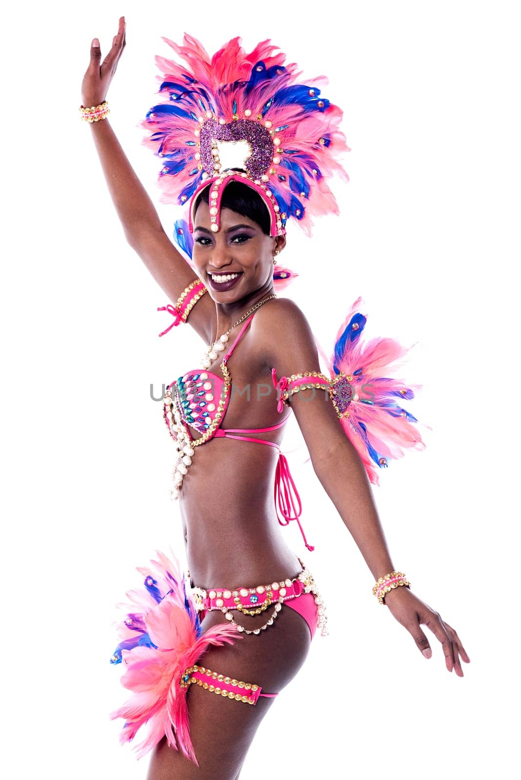 Samba dancer practicing dance steps over white