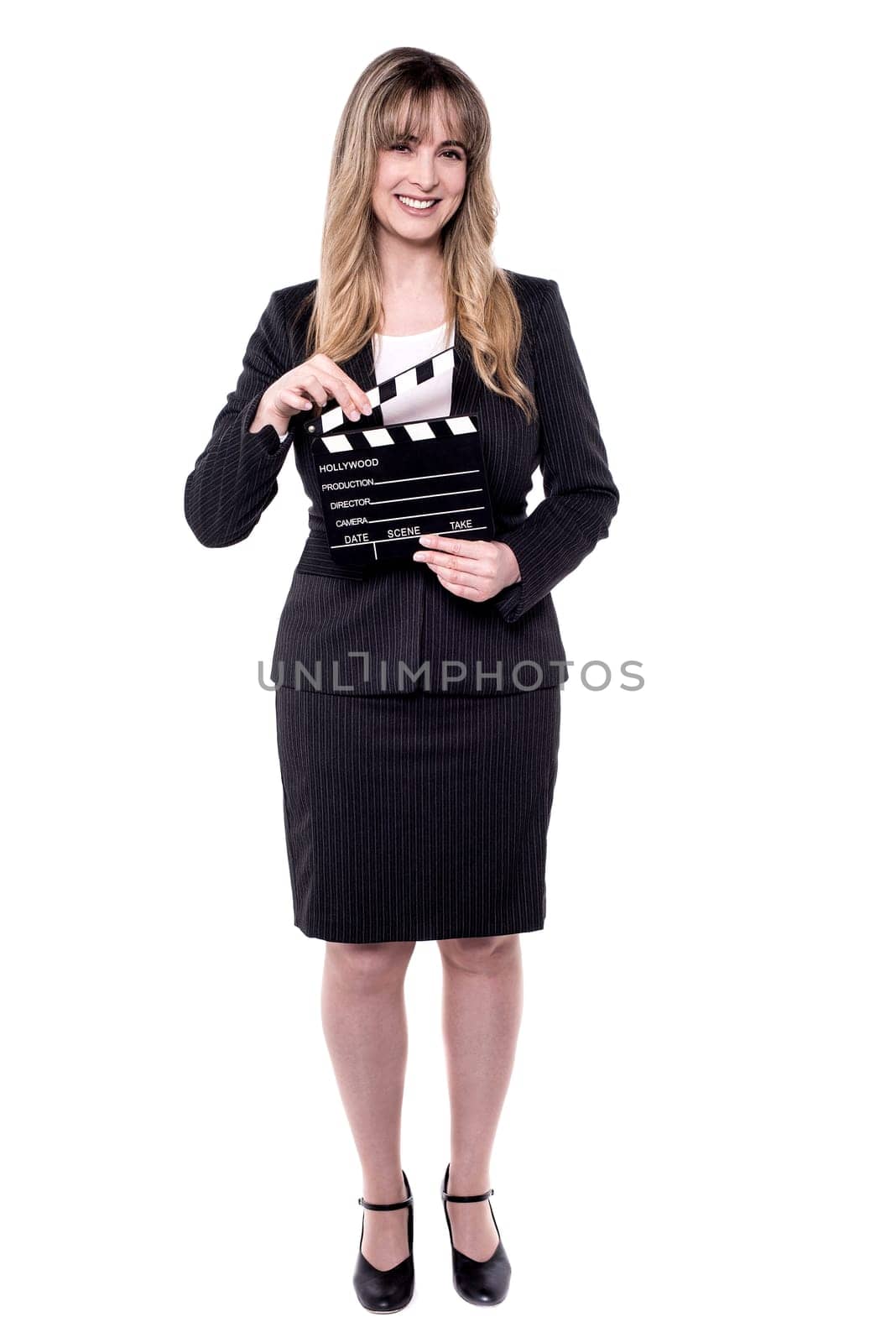 Business lady holding clapperboard. Shot on white background