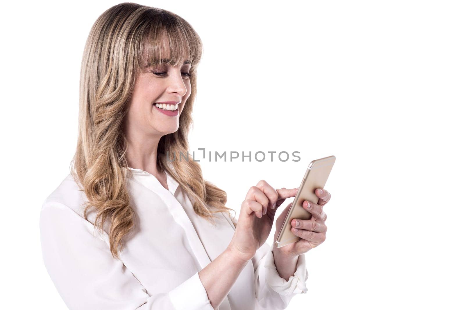 Attractive woman using her smart phone over white