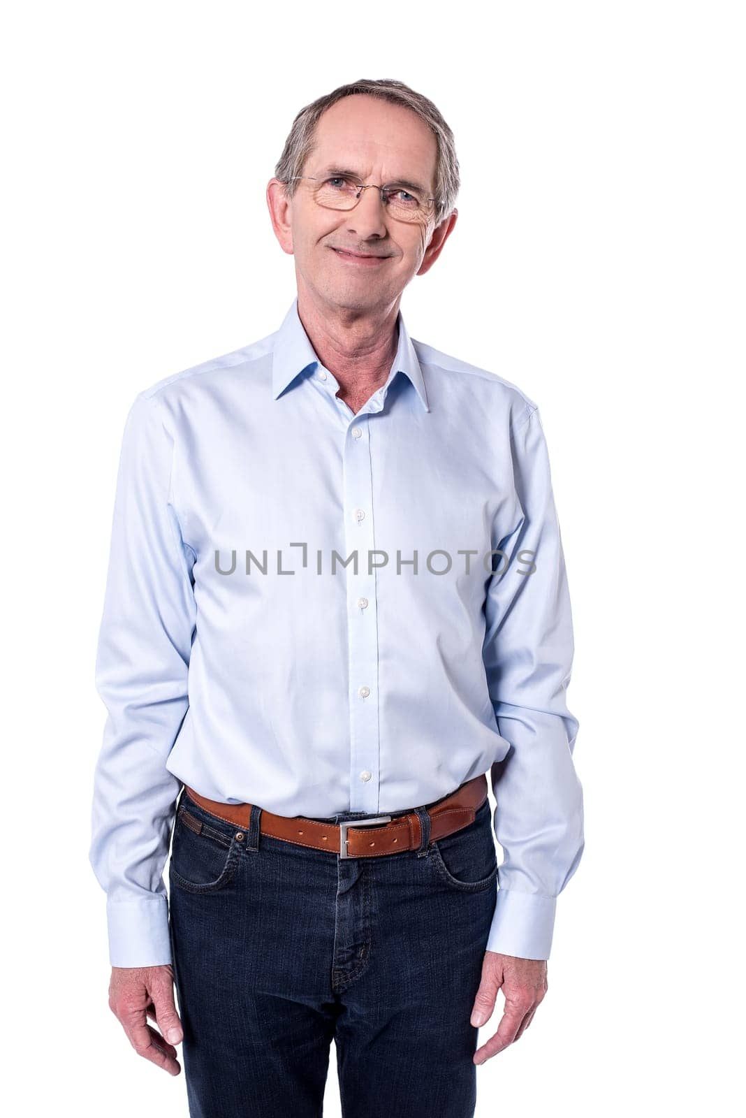 Image of a old man posing to the camera.