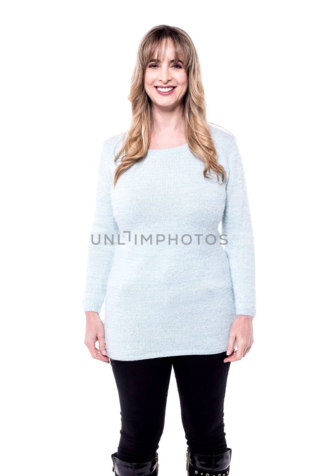 Pretty middle aged woman in trendy attire