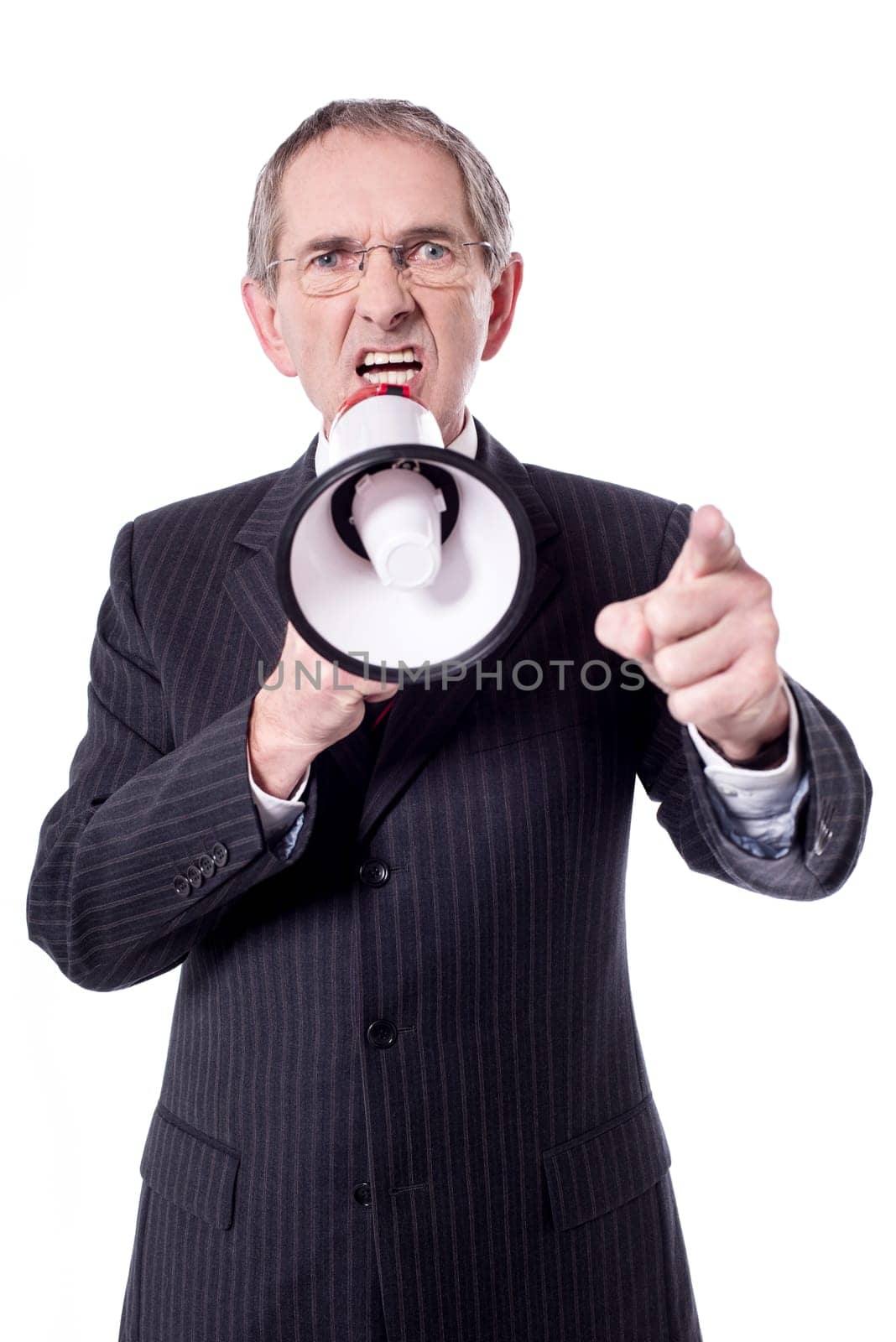 Senior male screaming loudly in a megaphone