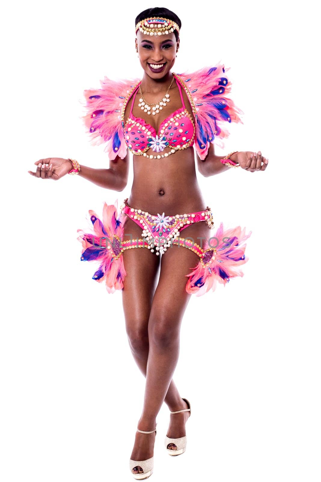 Woman dancer in a beautiful dance pose  and looking towards camera