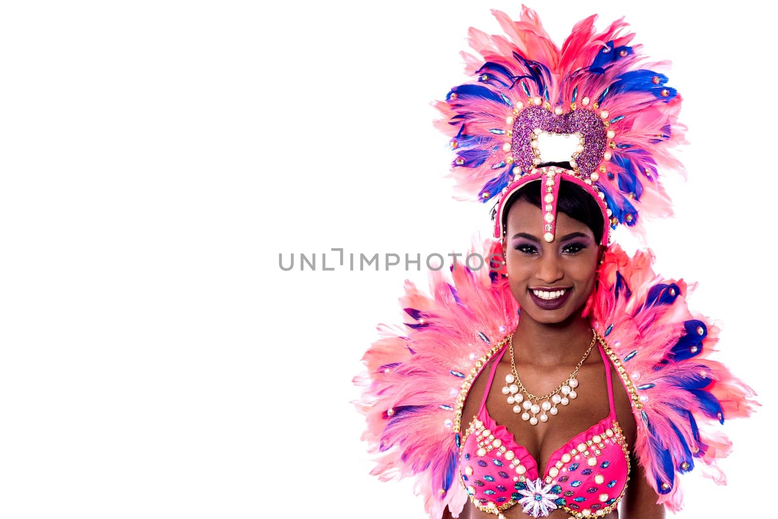 Woman samba dancer wearing feathery carnival costume