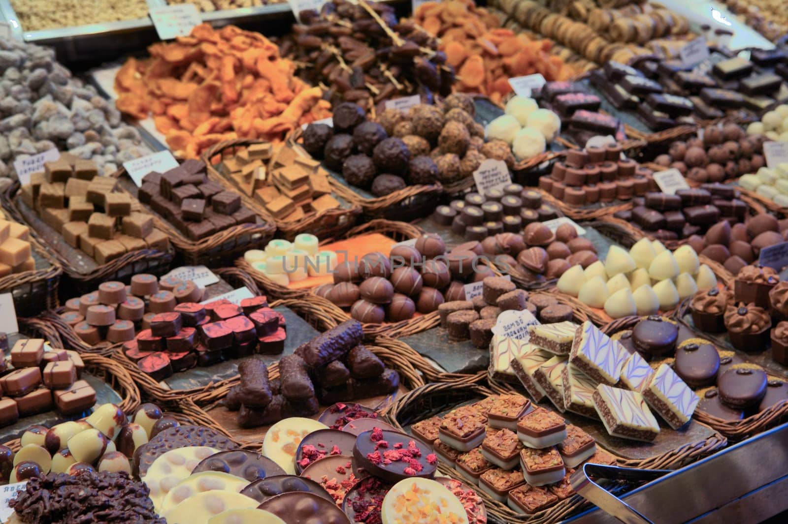 Loads of chocolate sweets on the Boqueria market in Barcelona, Spain