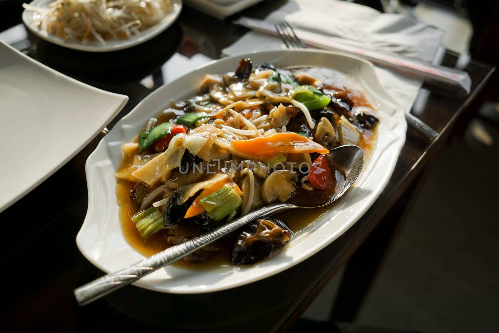 Chinese food - stir fry mixed vegetables with sauce.