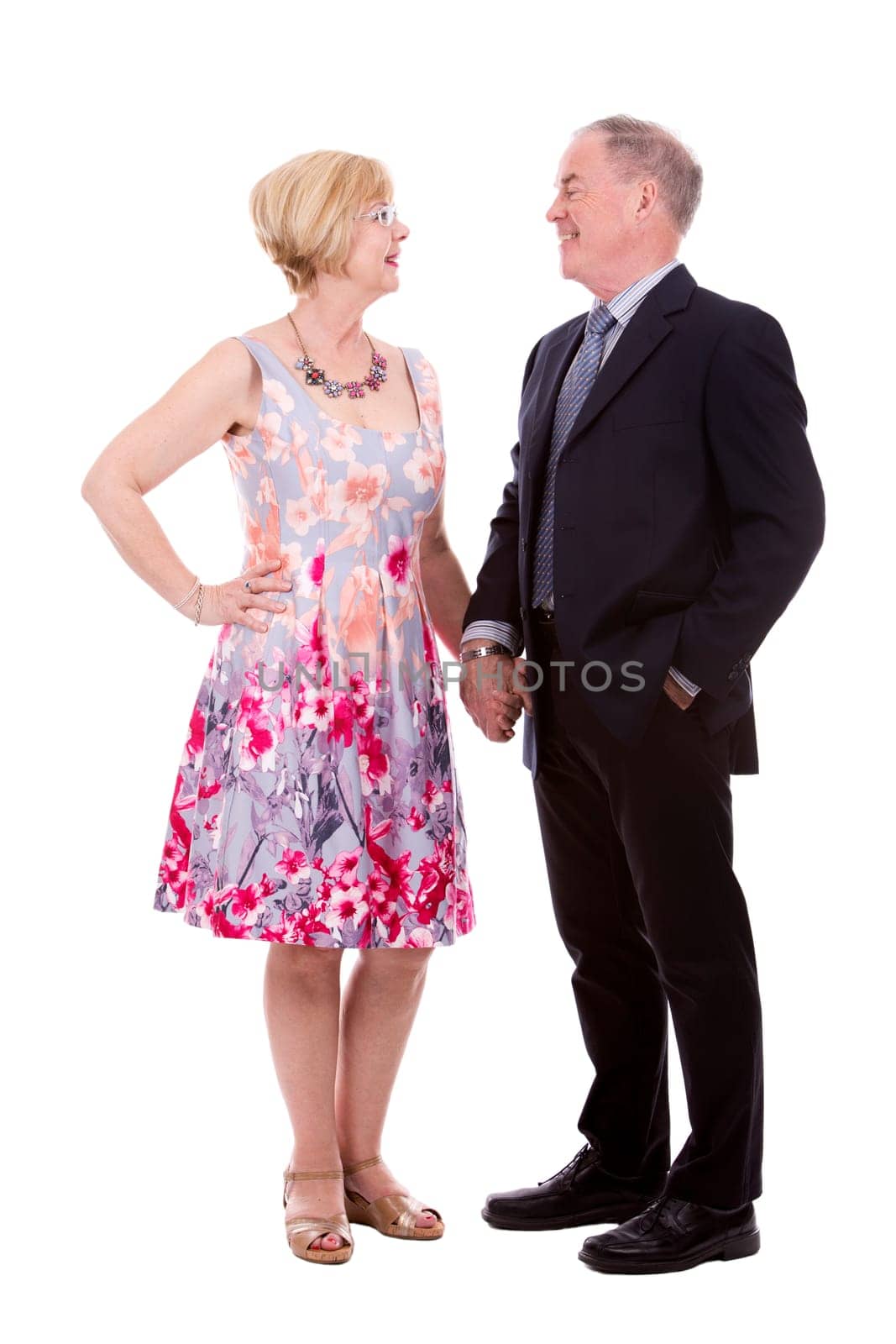 retired couple dressed up on white isolated background