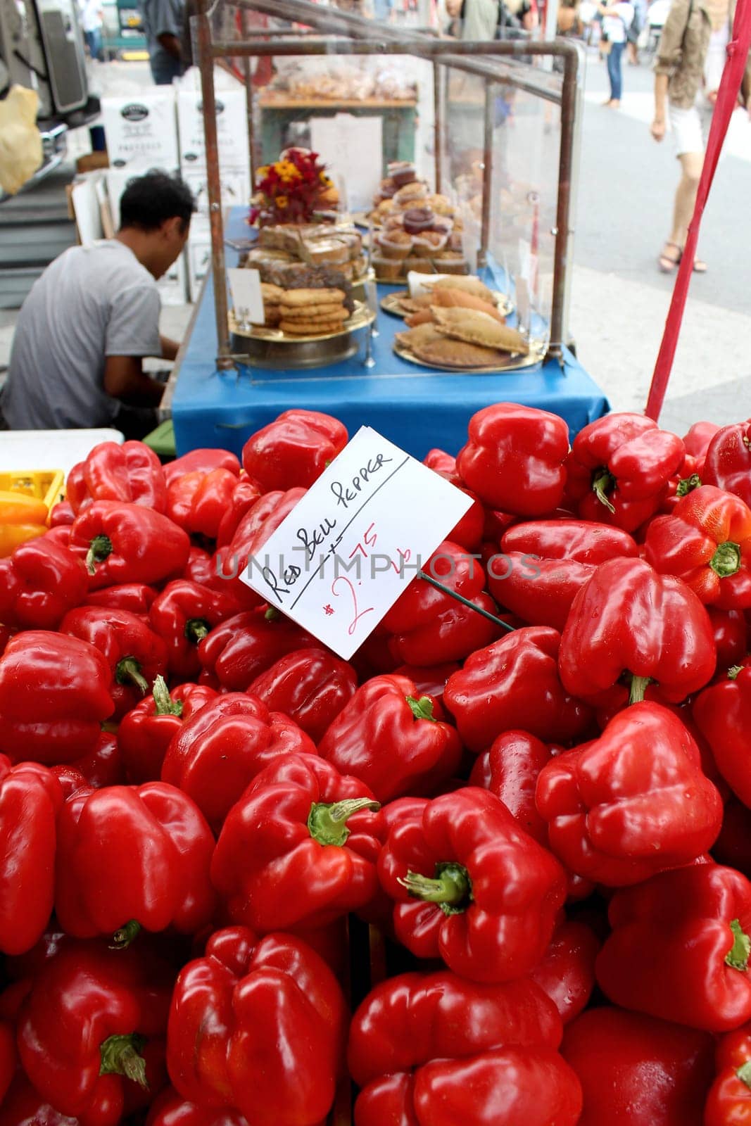Fresh organic red bell pepper background, photo taken at local farmers market, in New York City