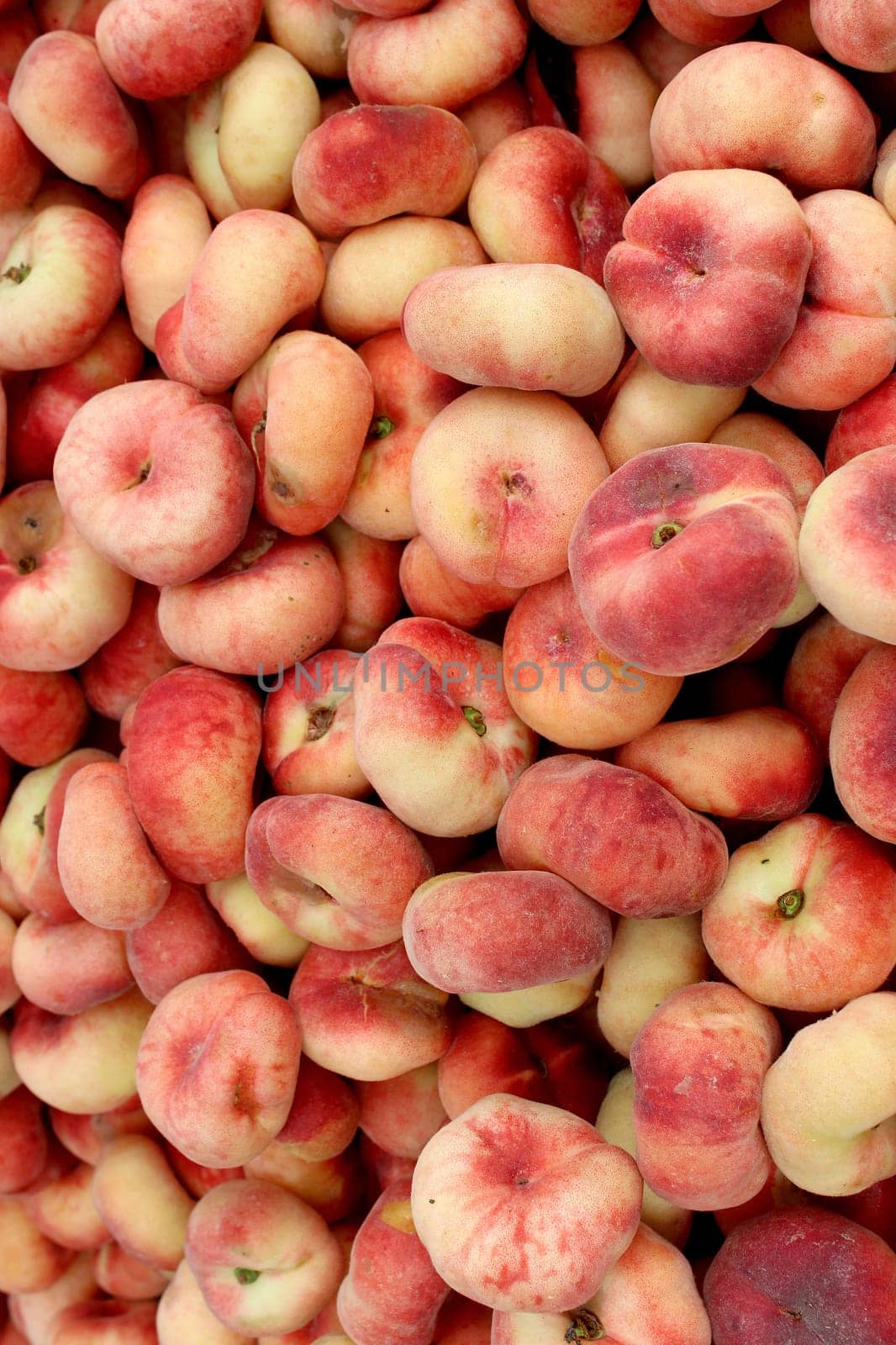 Fresh organic donut peaches background, photo taken at local farmers market, in New York City