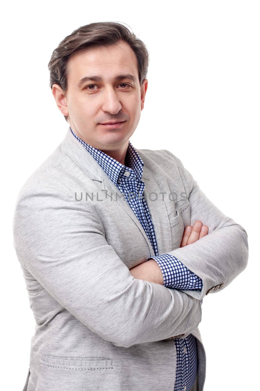 Portrait of smiling young business man in white coat