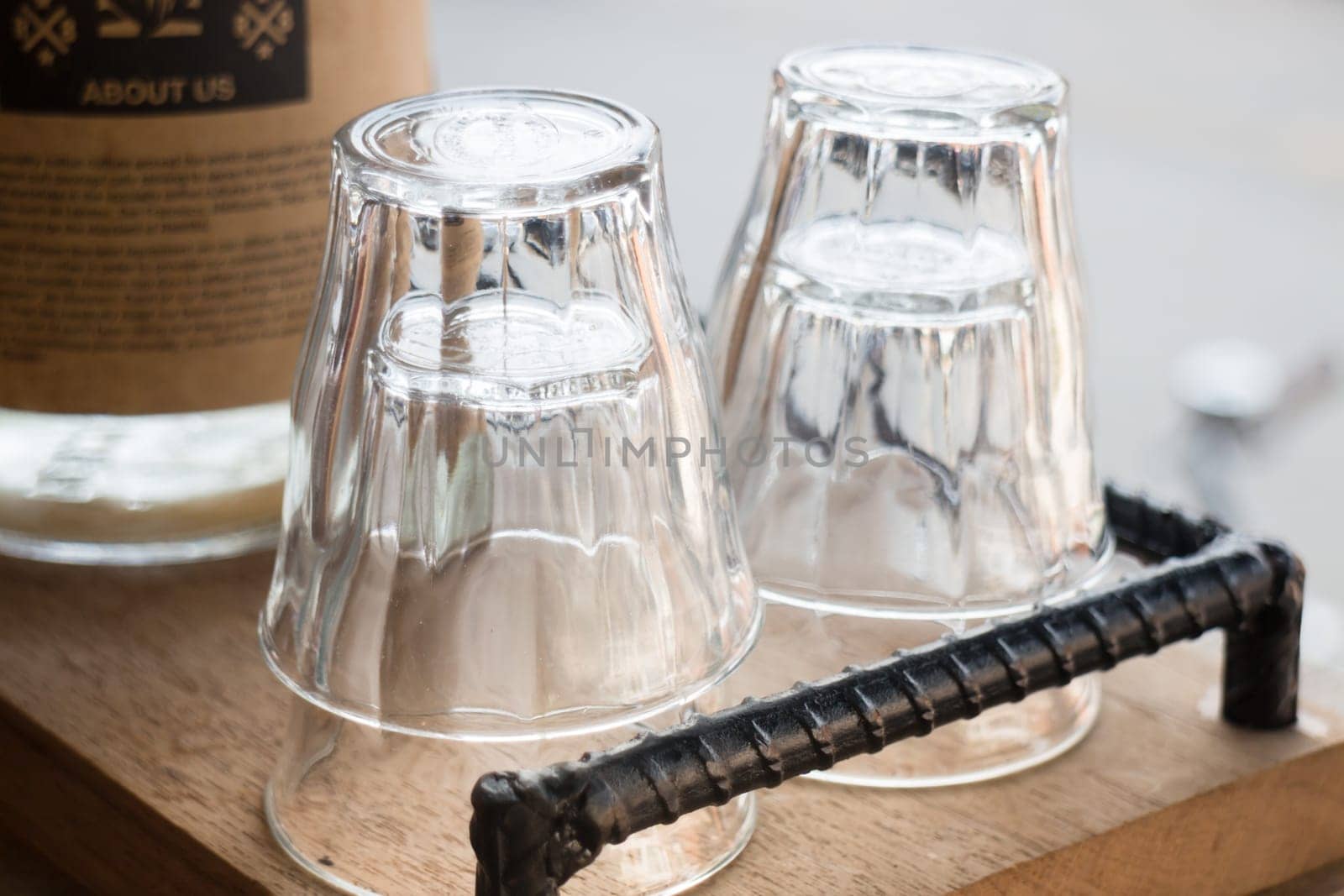 Clean glass in wooden tray, stock photo