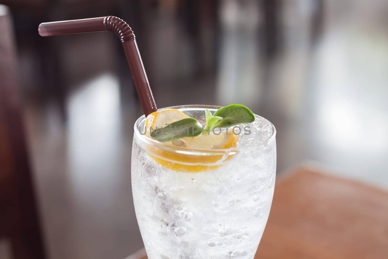 Glass of iced honey lemon soda, stock photo
