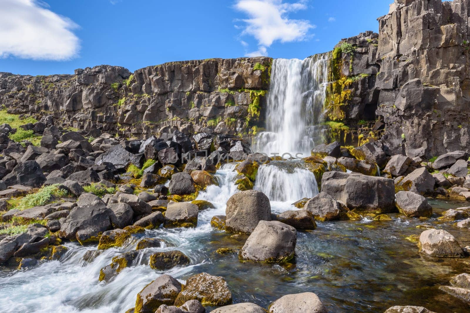 Beautiful Oxararfoss waterfall in summer, Thingvellir National Park, Iceland