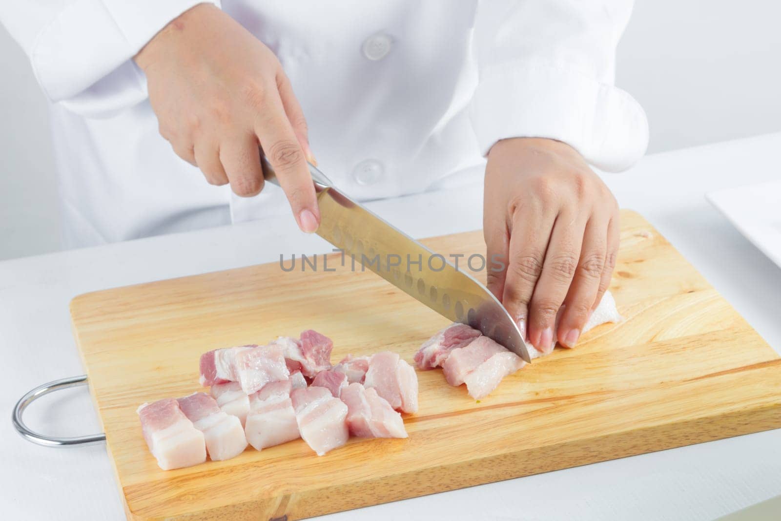 chef sliced streaky pork on cutting boards