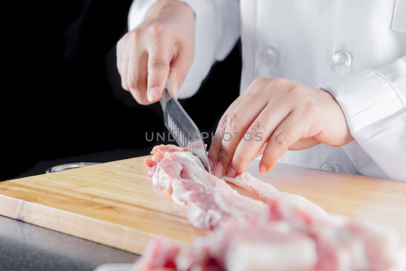 chef sliced streaky pork on cutting boards