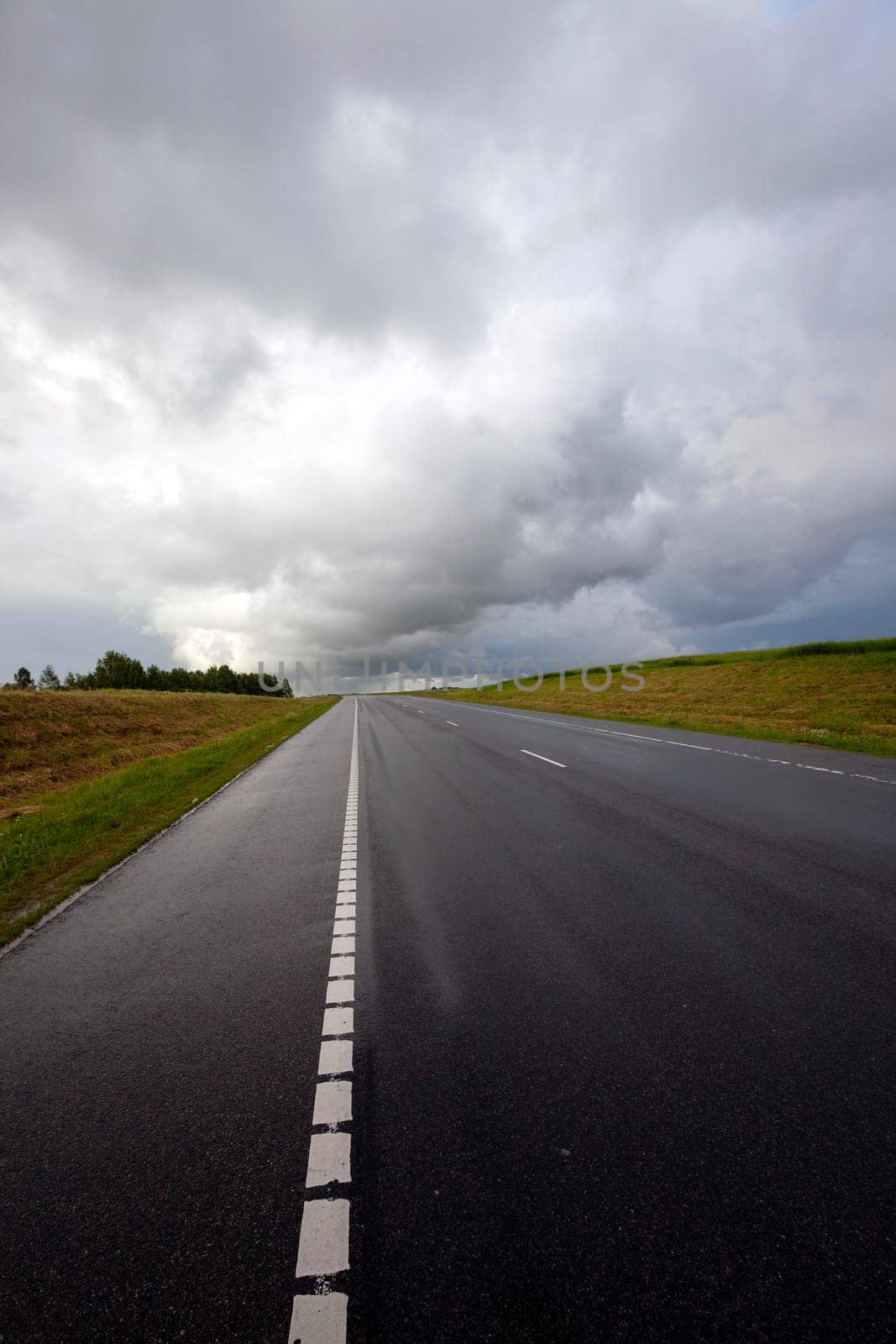 the highway in storm weather. Belarus. thunderstorm