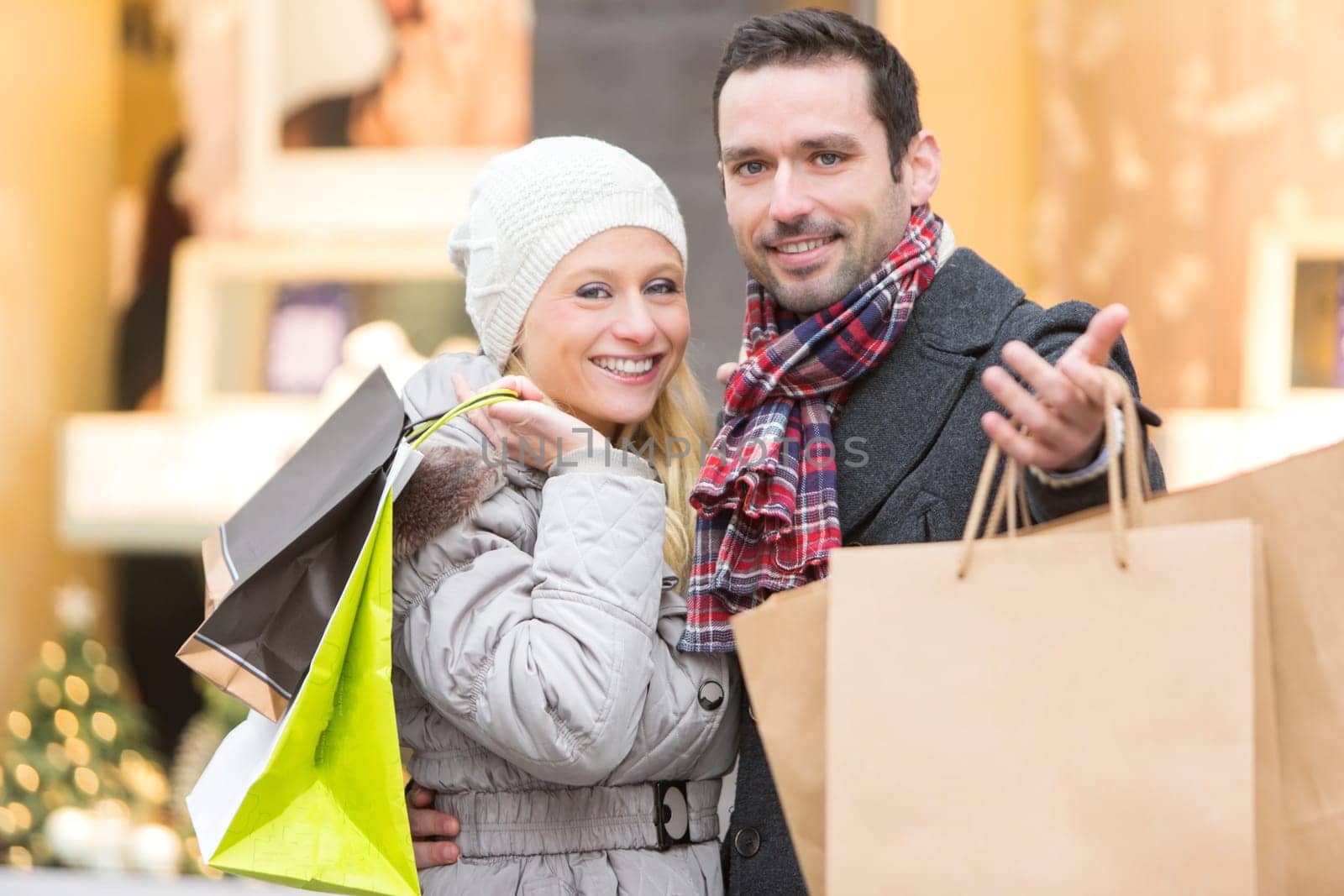 View of a Young attractive couple with shopping bags