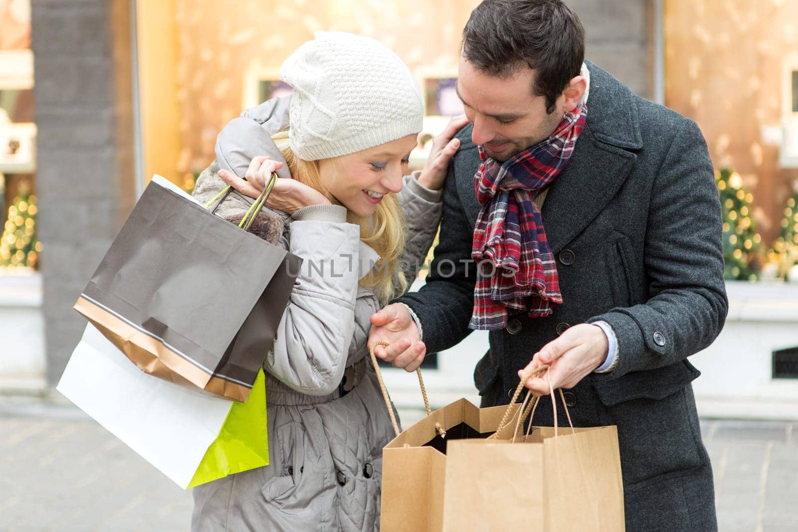View of a Young attractive couple with shopping bags